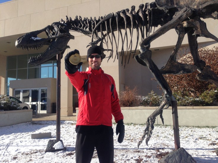 Yours Truly showing a little race hardware in front of Big Mike at the Museum of the Rockies.