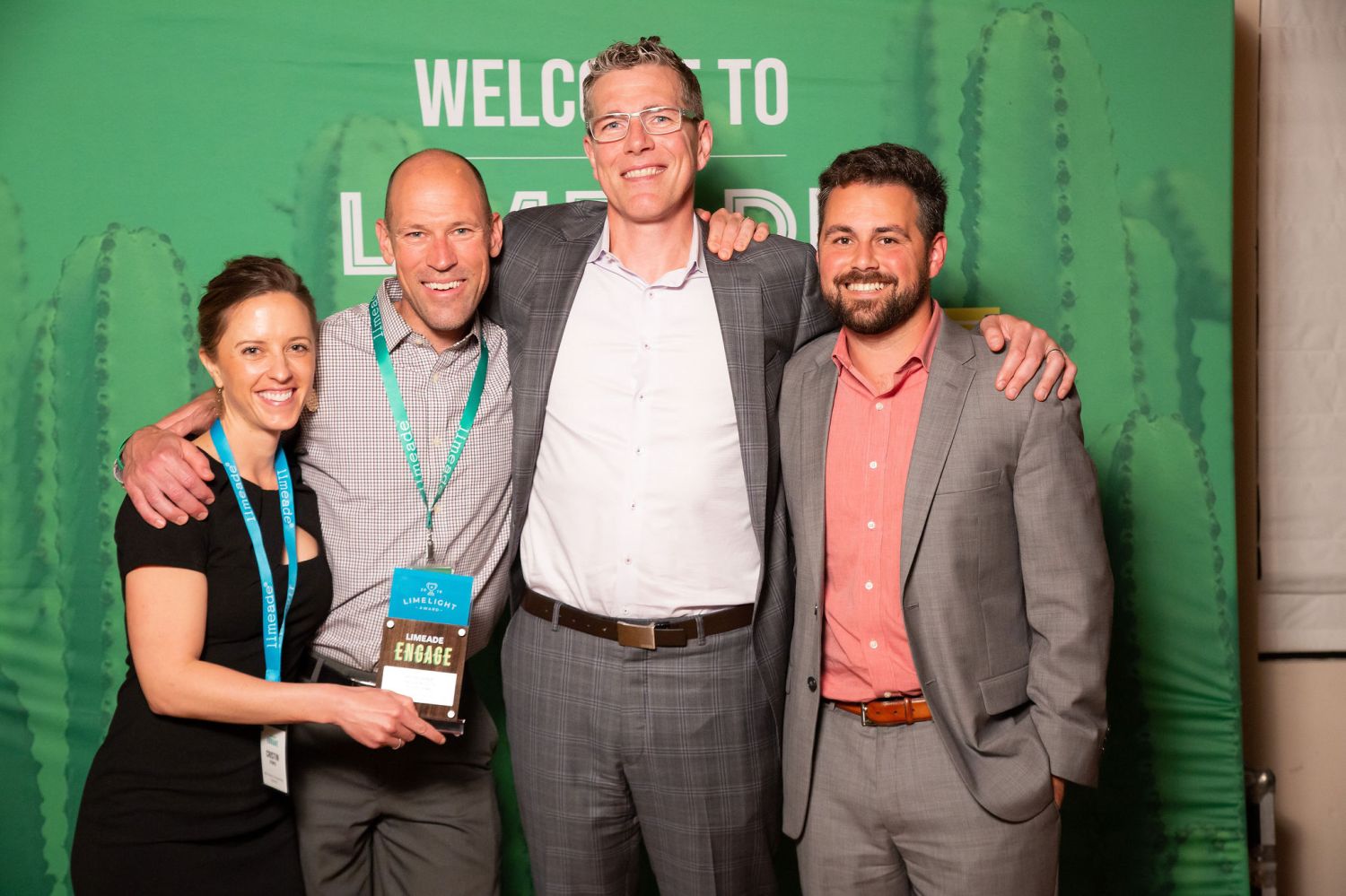 Cristin and Neal with Henry Albrecht, CEO of Limeade, and Joe Decker, our Limeade Account Manager.